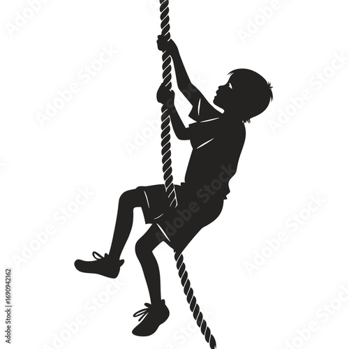 Boy climbing rope