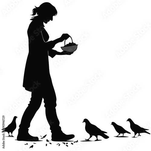 Woman feeding pigeons