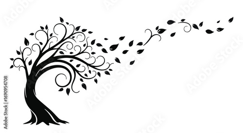 Elegant black tree silhouette with swirling branches and leaves blowing in the wind