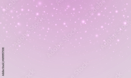Festive background with shimmering light, bokeh and sparkling stardust. Glistering confetti and magical particles create a glamorous night sky effect.