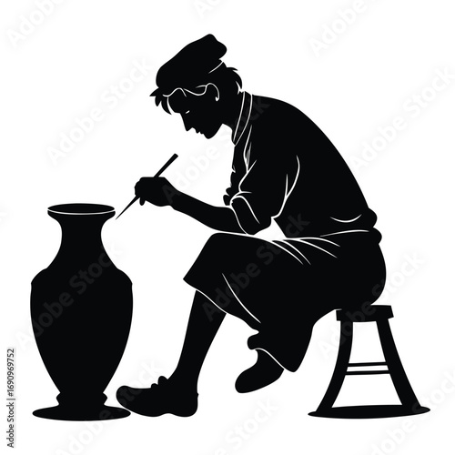 Potter painting pot