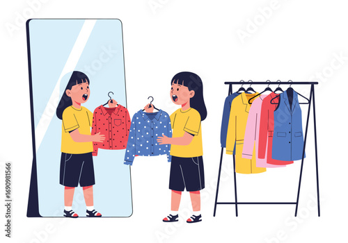 Young girl standing in front of mirror choosing clothes from a rack