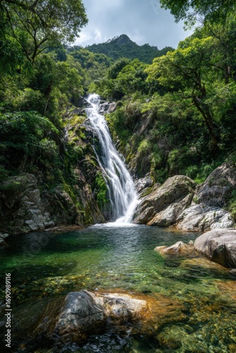 Lush Waterfall Cascading into a Crystal-Clear Pool