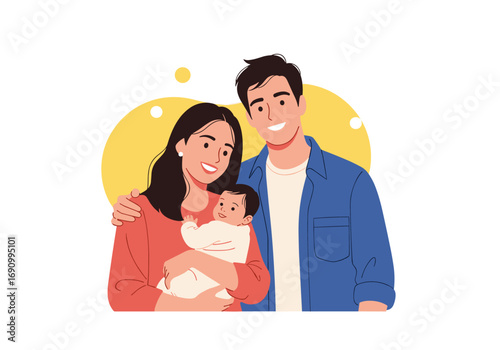 A happy young family poses together with their adorable baby in a joyful portrait
