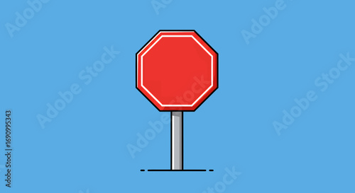 Red Octagon Stop Sign on a Pole.