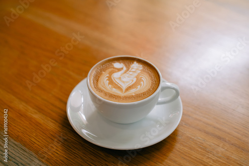 Latte art coffee in a white mug