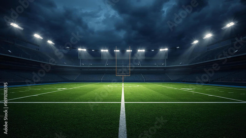 An empty American football stadium at night is illuminated by powerful bright floodlights casting long dramatic shadows.