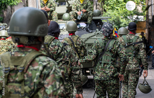 Colombian soldiers preparing for battle with armored tanks, Army in combat readiness, Military troops with heavy vehicles. High quality photo