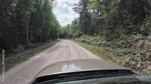 POV Car driving on unpaved rural road in the forest. Timelapse, Hyperlapse
