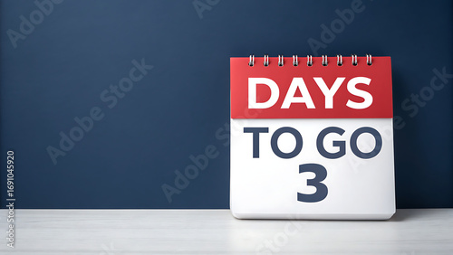 A red and white flip calendar prominently displays the number three with the words days to go indicating a countdown to an important event or deadline