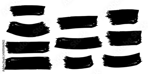 Collection of eleven black brush stroke shapes in various styles and orientations on a white background