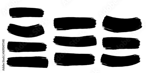 Illustration of nine black brush strokes with varying shapes and textures on a white background plain canvas