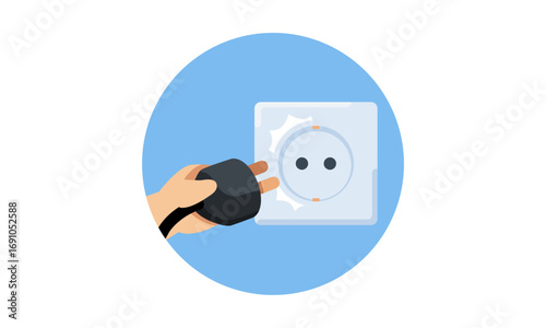 Hand plugging a black electrical plug into a white wall socket.
