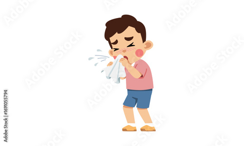 A young boy is sneezing into a tissue, with droplets of mucus spraying out.