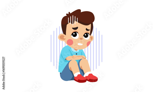 Sad boy sitting with worried expression.