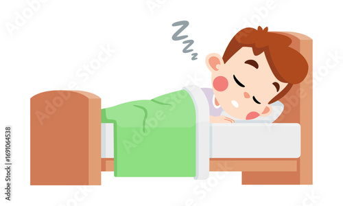 A young boy is sleeping soundly in his bed, covered by a green blanket.