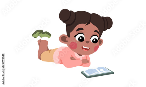 A cute cartoon girl with dark skin and hair buns, lying on her stomach and happily reading a book on a white background.