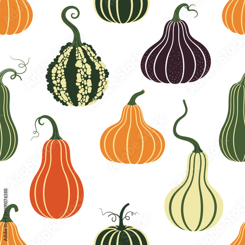 Seamless pattern of assorted gourds and pumpkins in various colors and shapes for autumn decor