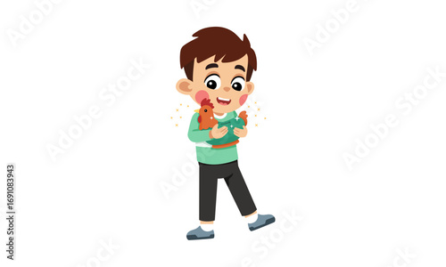 A young boy with brown hair and a green sweater happily holds a small, cuddly chicken toy in his arms, smiling joyfully