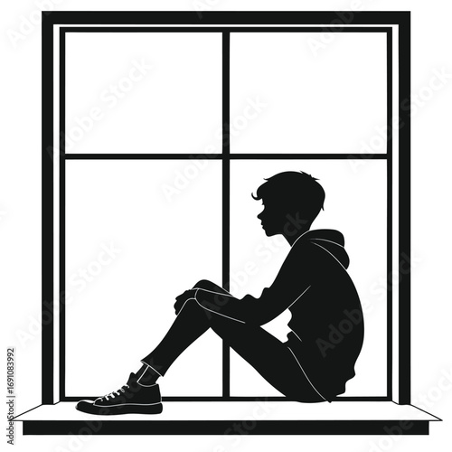Teen sitting on window sill