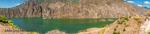 14 July 2025 Tortum Erzurum. Tortum waterfall, tortum dam, lake and fish farms on the lake on a sunny day.