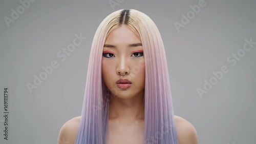 Stunning hairstyle transformation with vibrant colors and precise styling techniques in a studio setting