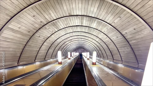 A long tunnel with three escalators. Russia. Moscow. 07.09.25