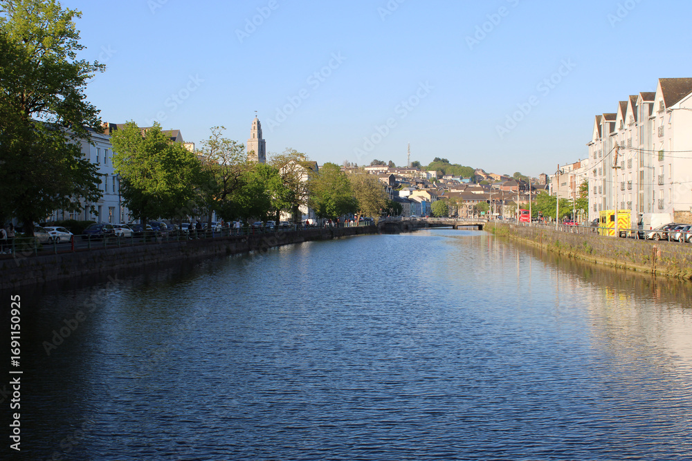 Fototapeta premium River Lee on a sunny evening in centre city Cork, Ireland