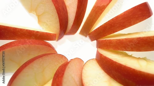 Slices of Red Apple on White Background Macro Studio Shot Fresh and Juicy