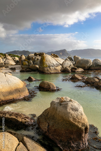 Granite rocks in the ocean at Boulders Beach in Simons Town, Cape Town.