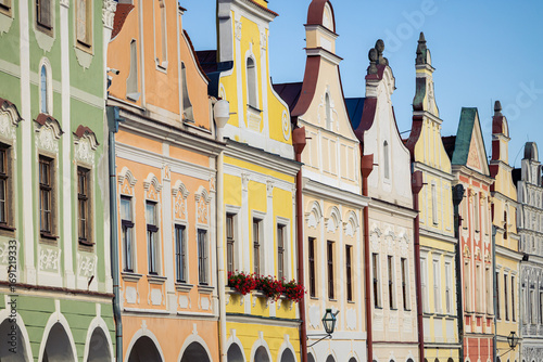 Historical building facades detail with blue sky on background, Telc, Czechia