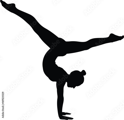 Silhouette of a female gymnast performing a handstand with split legs graceful movement and balance represented in black and white