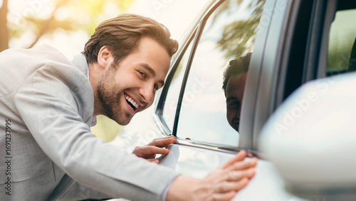 Canvastavla Man hugs new car he dreams about, stand in cars showroom near to white automobile, want to buy it