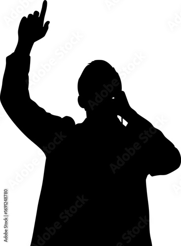 Confident speaker points upwards, inspiring audience with powerful message and dynamic gesture