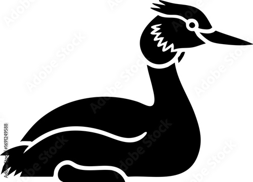 Elegant black silhouette of a distinctive water bird resting peacefully by the water's edge