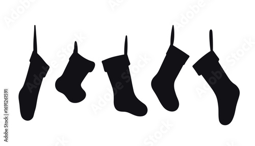 Christmas stockings hanging in a row on white background  