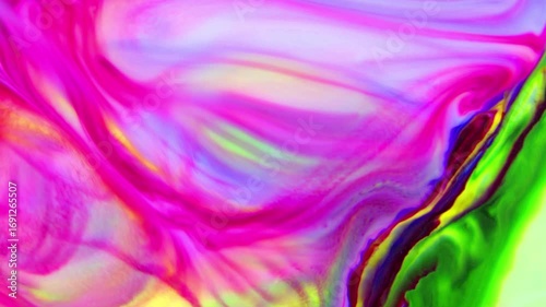 Close-up shot of multi-colored paint mixture boiling in a mixer. They form a unique abstraction that can be used in many video projects, as a background or as a compositing element.