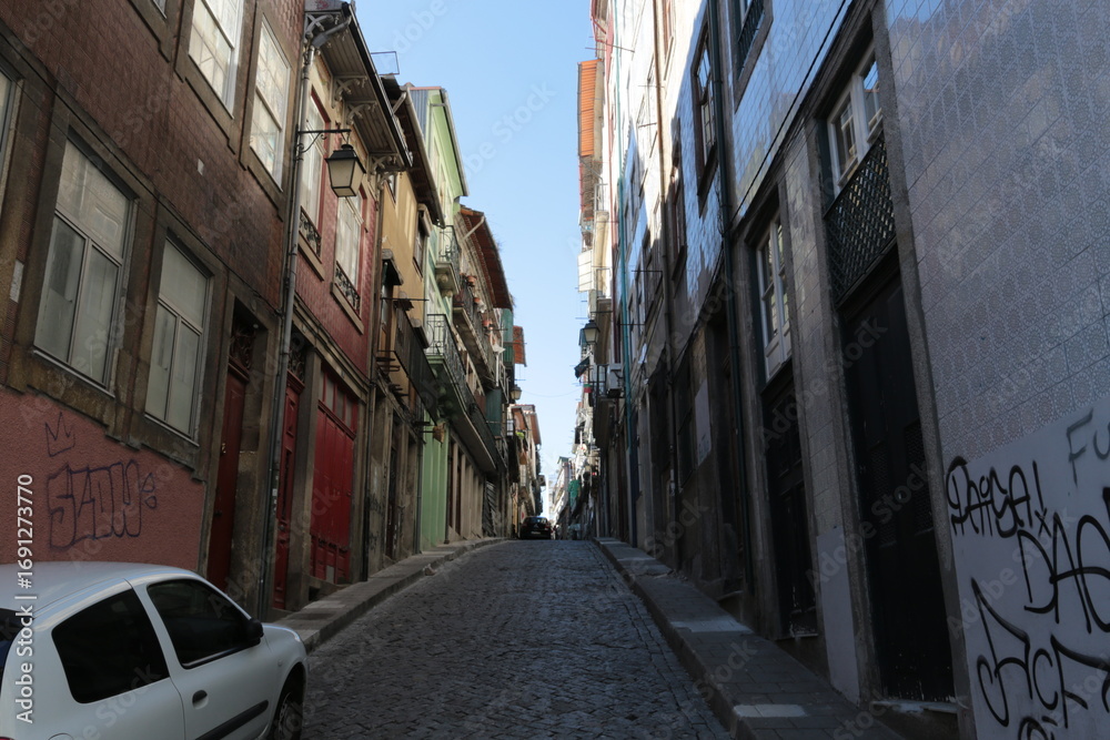 Fototapeta premium Historic Old Town Street with Traditional Architecture in Porto