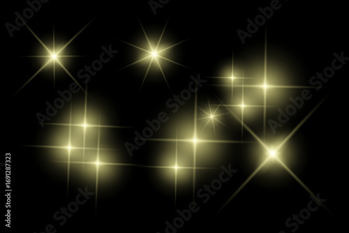 Golden sparkle  lights, flashing lights, light effects, sunlight lens flare, glowing ray beams, sparkling starsicon on black background.