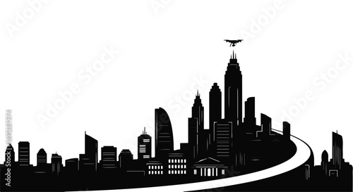 Modern city skyline silhouette with a curved road leading into the urban landscape.