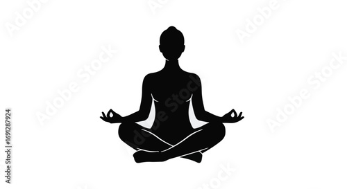 Serene silhouette meditating in a peaceful lotus pose, symbolizing mindfulness and tranquility.