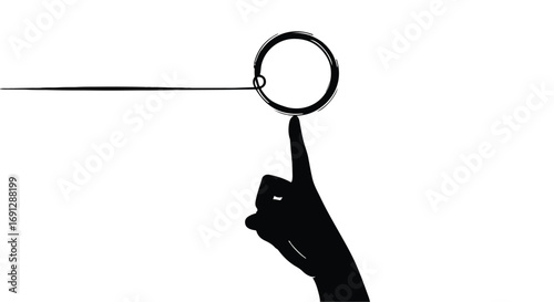 Finger pointing to a circular target, symbolizing focus and achievement