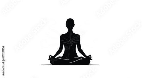 Silhouette of a person meditating in a serene lotus pose, radiating inner peace and mindfulness.