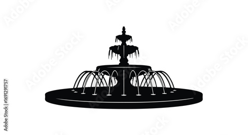 Elegant tiered fountain with cascading water streams in a serene setting