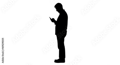 Silhouette of a Man Standing and Engaged with His Mobile Phone, isolated transparent background.