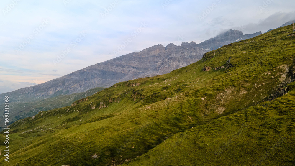 Obraz premium Drone view mountain road, travel, clouds over Alps | Drohnenaufnahme Bergstraße, Reise, Wolken über Alpen