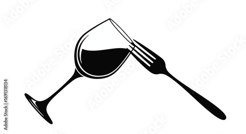 Elegant wine glass with red liquid paired with a fork, symbolizing a sophisticated dining experience