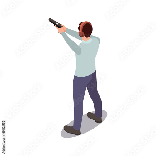 Man practicing shooting with gun at shooting range