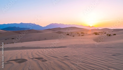 Sunrise over a vast desert landscape