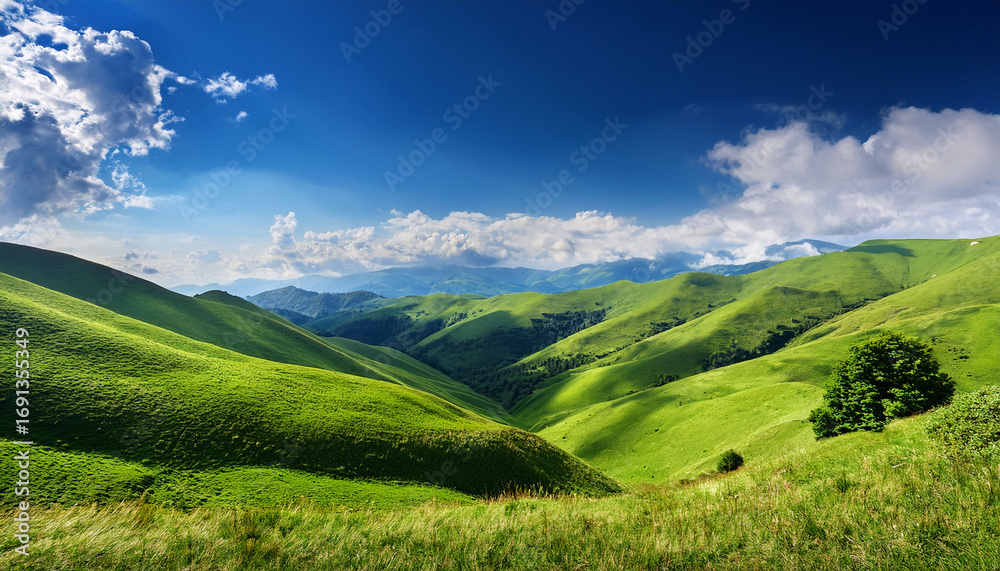 Fototapeta premium Lush Green Hills Under A Bright Blue Sky With Fluffy Clouds And Vibrant Nature Surrounding